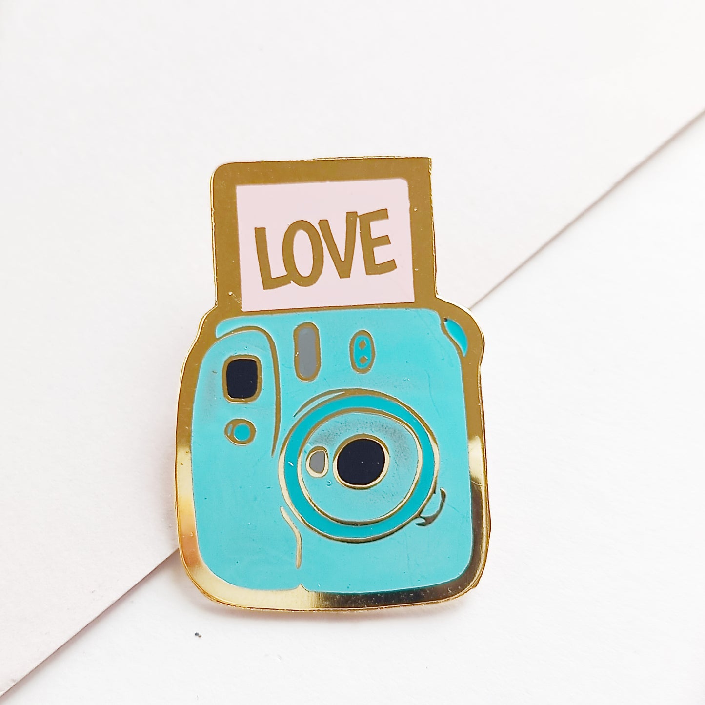 Insta camera pin
